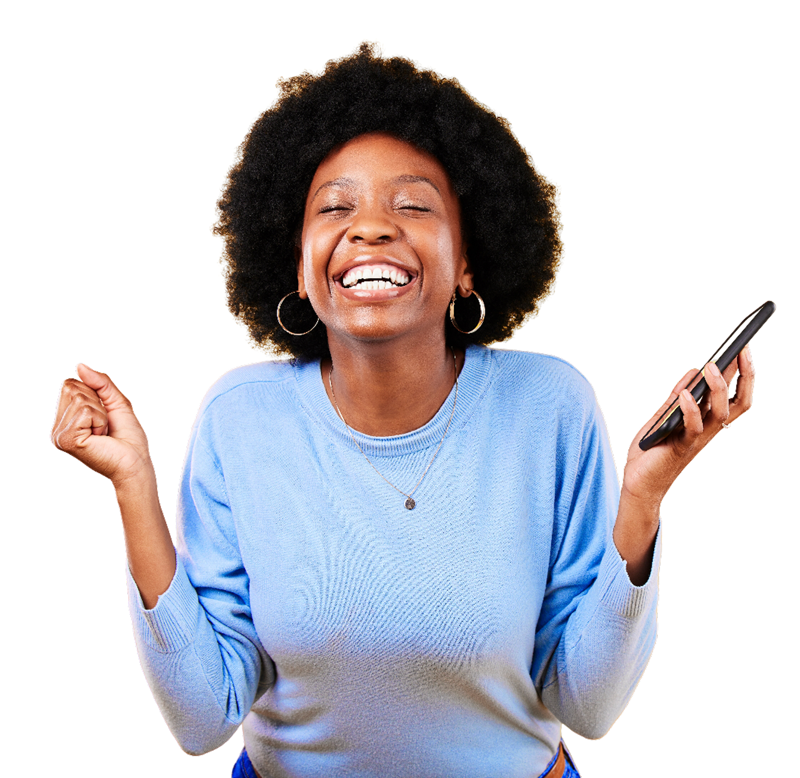 A person has their eyes closed, and is smiling whilst holding up their phone in their right hand whilst the other hand is clenched.